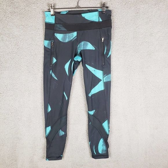 lululemon athletica Pants - Lululemon Cropped 7/8 Leggings Mesh Cutouts Blue Black Size 4 5 Pocket VGUC